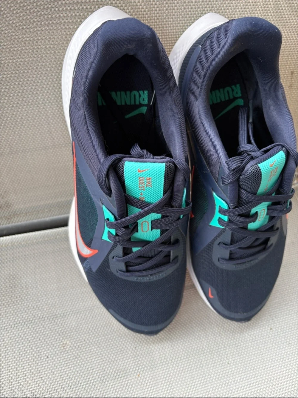 Nike Stylish Navy and Teal Women’s Running Sneakers with Orange Swoosh
